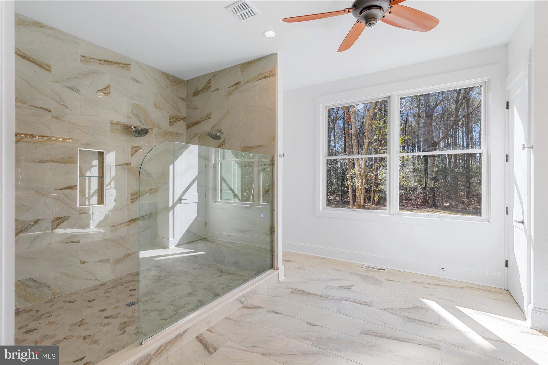 30425 Hollymount Road Harbeson, DE 19951 - Photo 44 of 98 a view of a livingroom with a ceiling fan and window