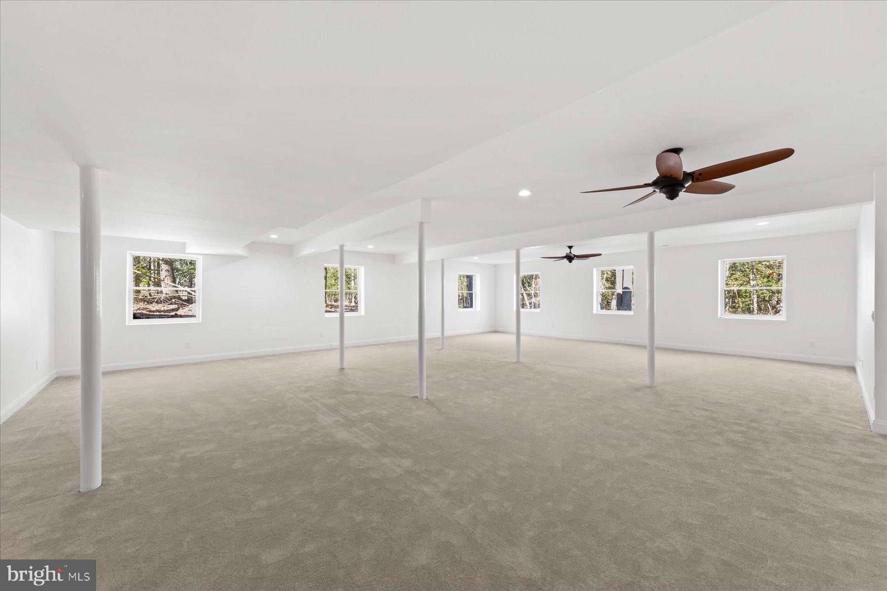 30425 Hollymount Road Harbeson, DE 19951 - Photo 77 of 98 a view of a livingroom with a ceiling fan