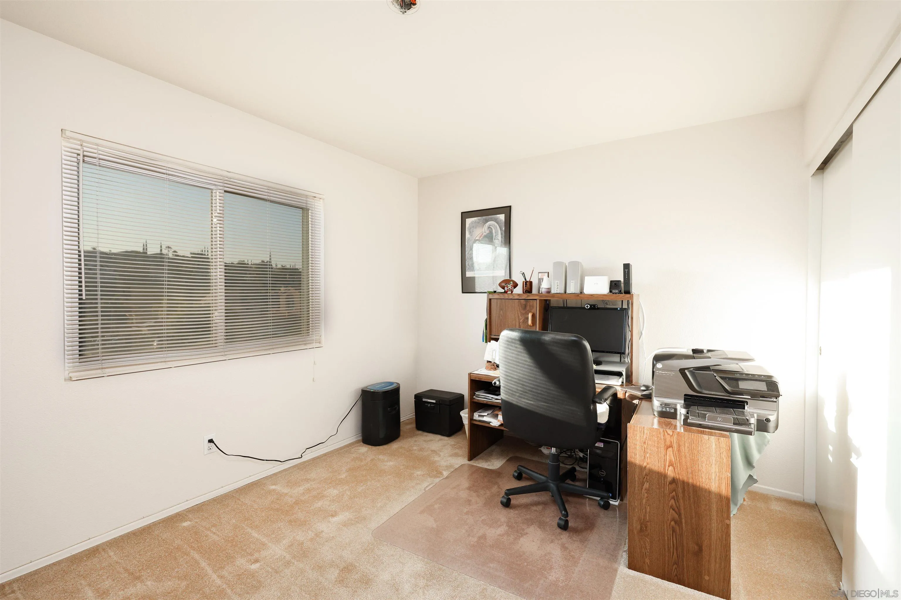 2 Bella Minozza Lake Elsinore, CA 92532 - Photo 15 of 30 a view of a workspace with furniture and a window