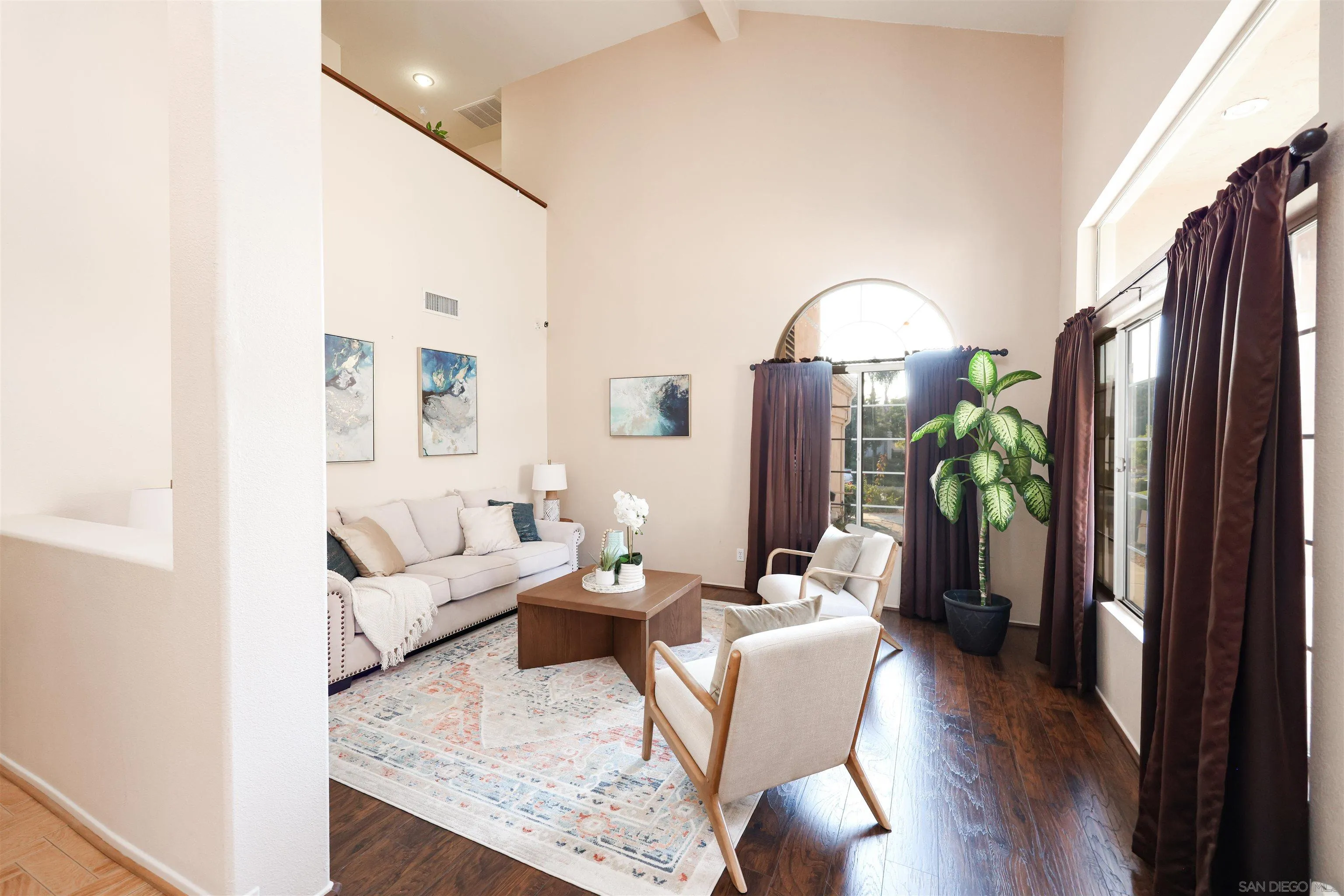 2 Bella Minozza Lake Elsinore, CA 92532 - Photo 2 of 30 a living room with furniture fireplace and wooden floor