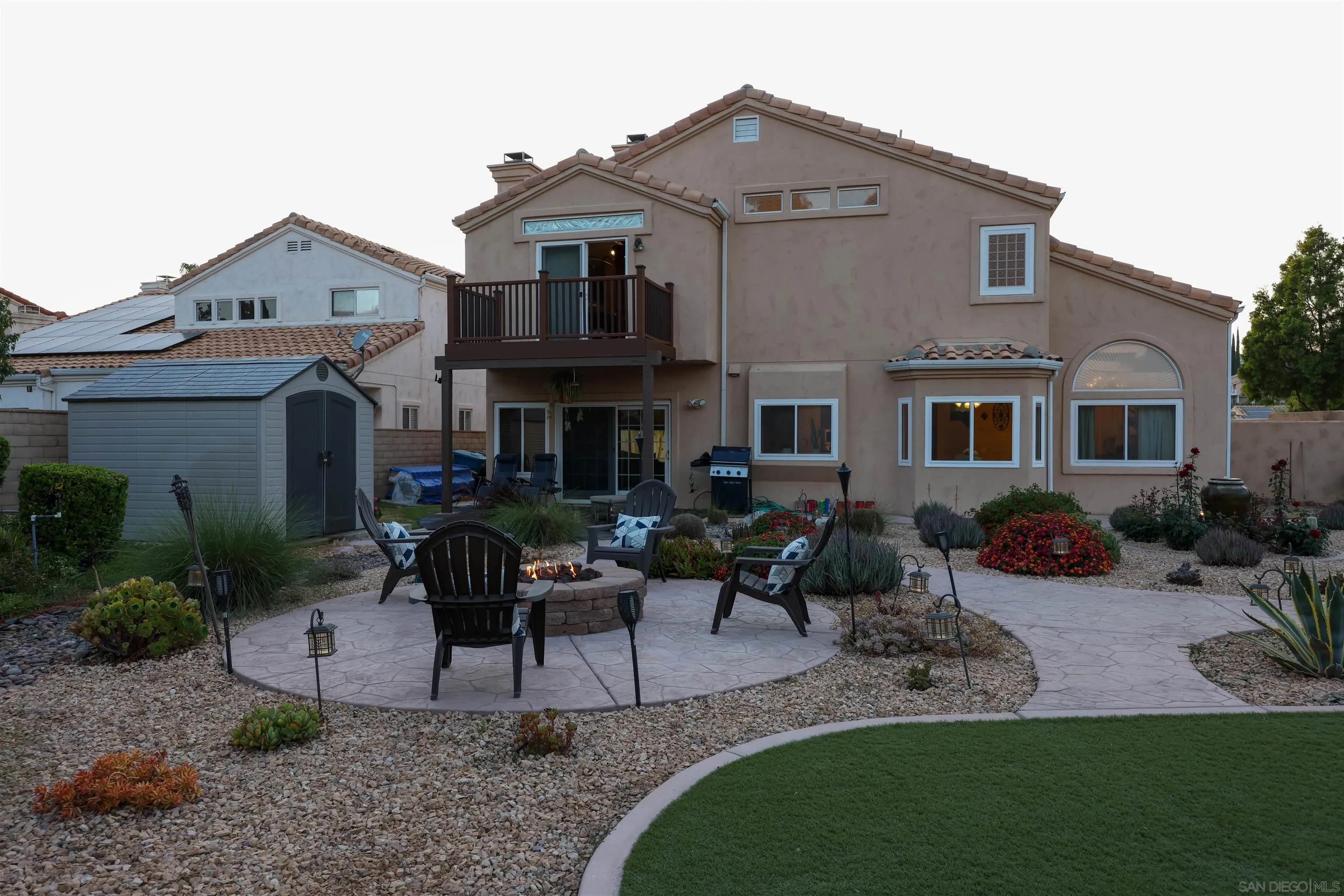 2 Bella Minozza Lake Elsinore, CA 92532 - Photo 23 of 30 a view of a house with a yard porch and sitting area