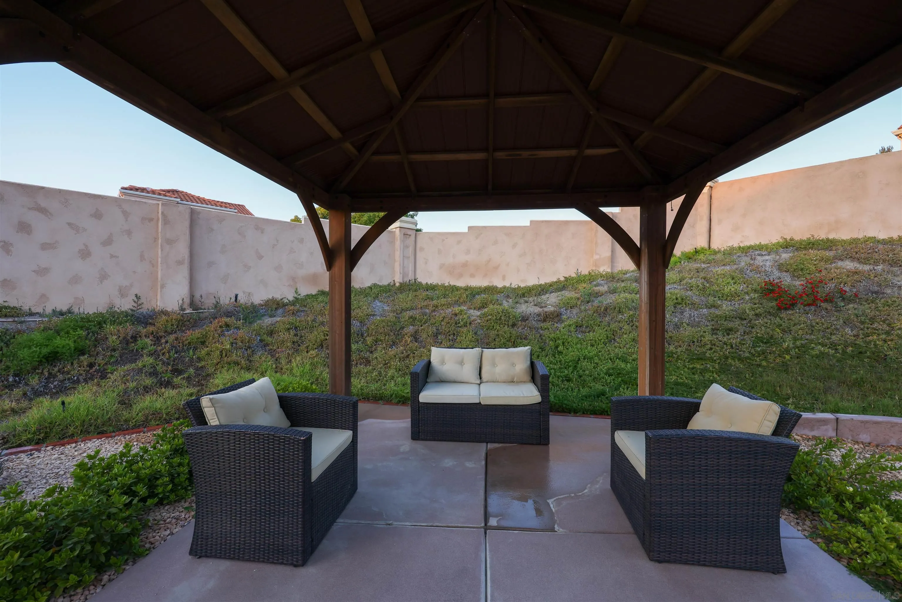 2 Bella Minozza Lake Elsinore, CA 92532 - Photo 24 of 30 a patio with yard table and chairs