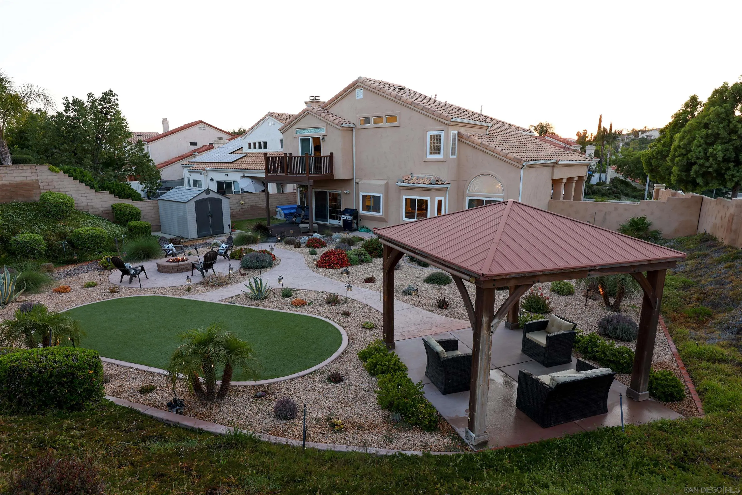 2 Bella Minozza Lake Elsinore, CA 92532 - Photo 26 of 30 a view of a house with backyard sitting area and swimming pool