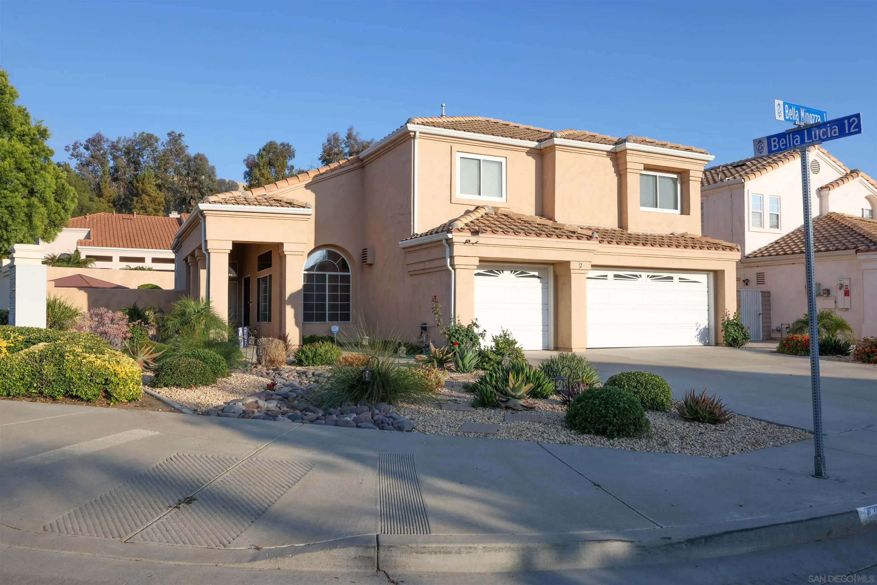 2 Bella Minozza Lake Elsinore, CA 92532 - Photo 29 of 30 a front view of a house with garden