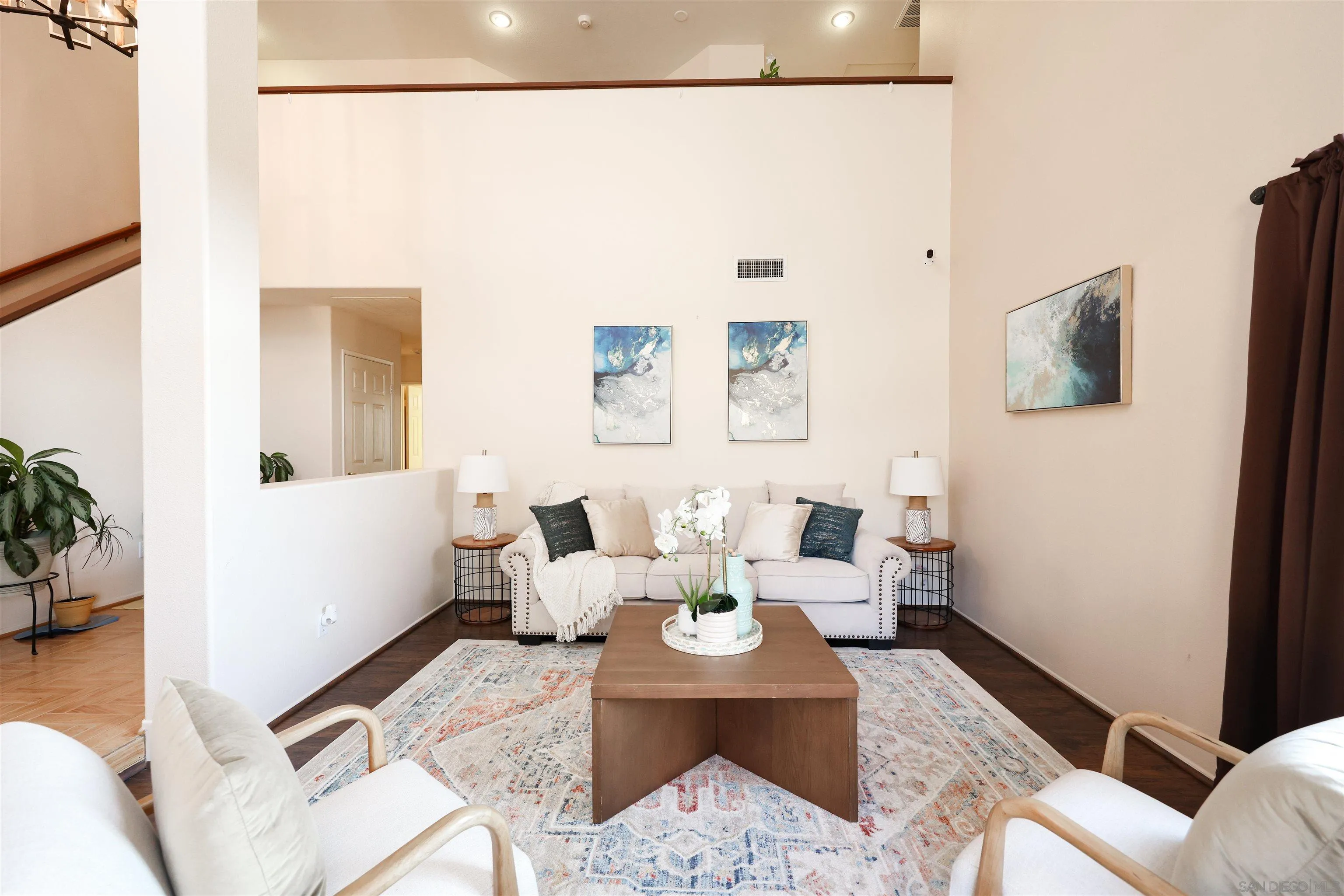 2 Bella Minozza Lake Elsinore, CA 92532 - Photo 3 of 30 a living room with furniture and a flat screen tv