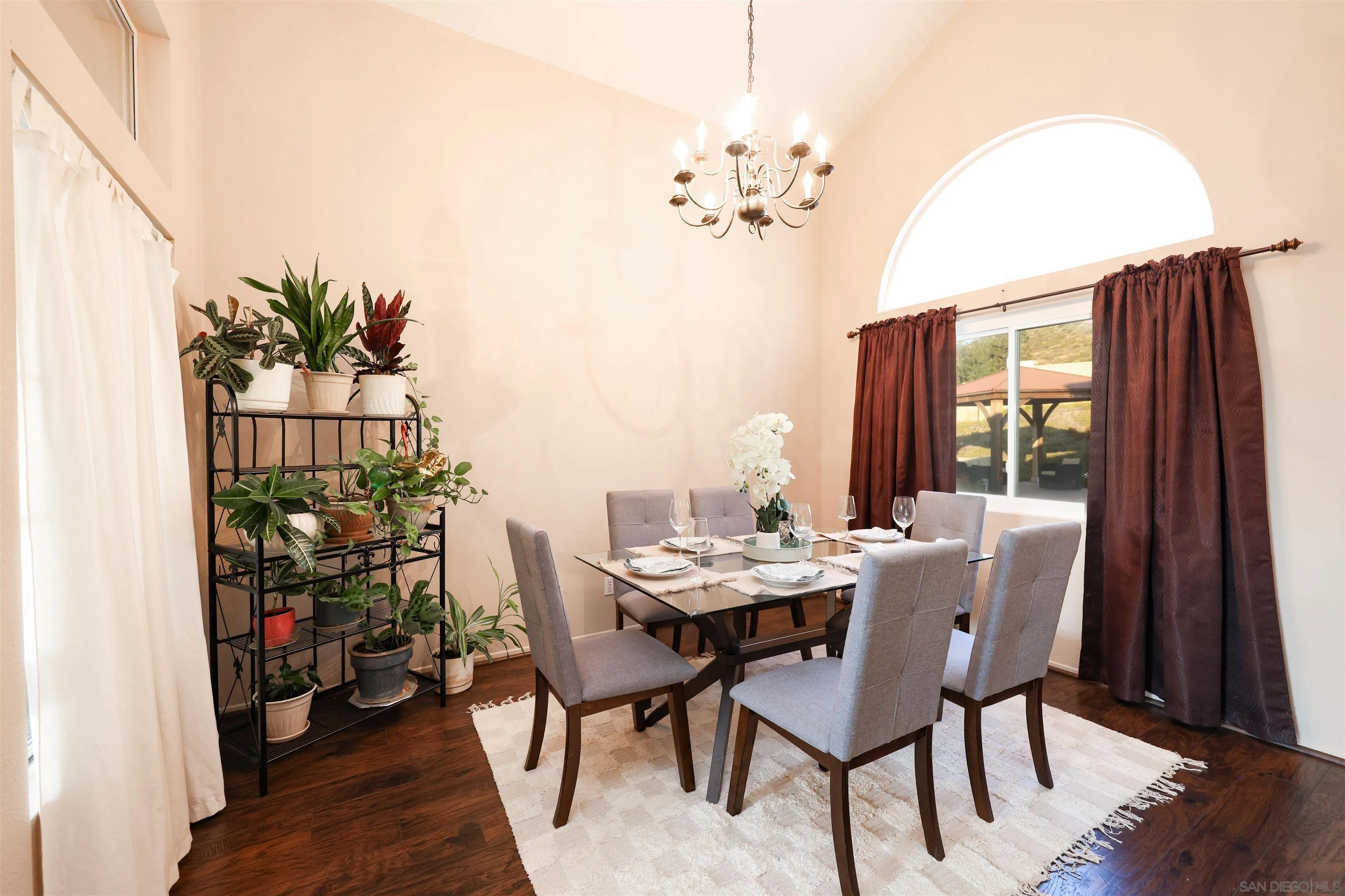 2 Bella Minozza Lake Elsinore, CA 92532 - Photo 5 of 30 a view of a dining room with furniture window and wooden floor