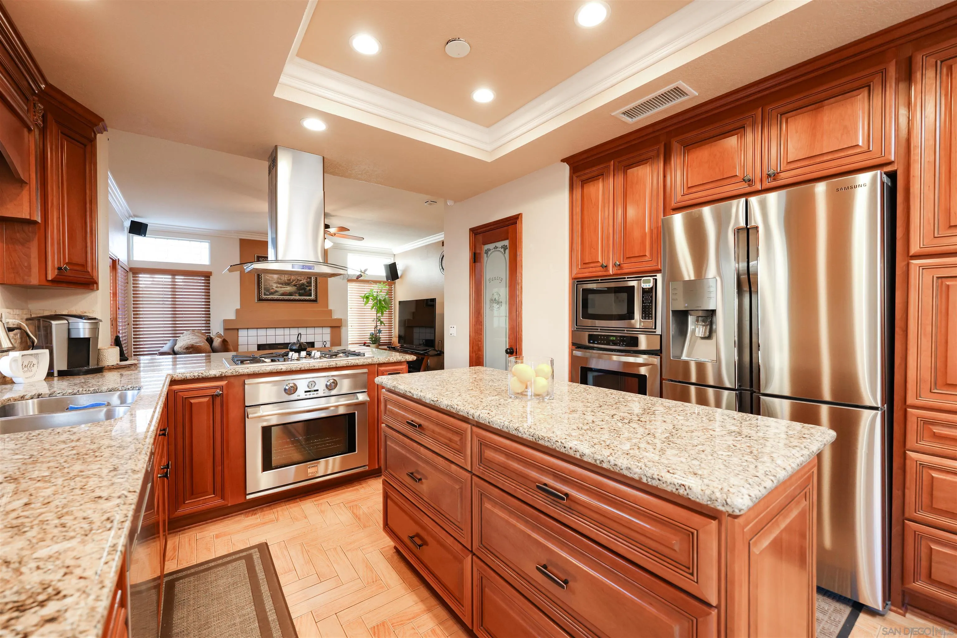 2 Bella Minozza Lake Elsinore, CA 92532 - Photo 8 of 30 a kitchen with stainless steel appliances granite countertop a refrigerator a stove and a sink