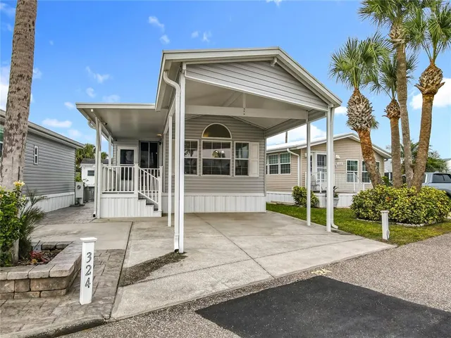 a front view of a house with a porch