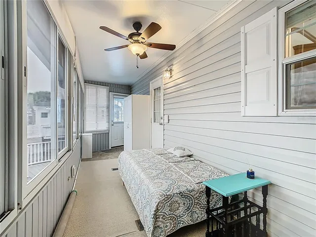 a view of a livingroom with furniture and window