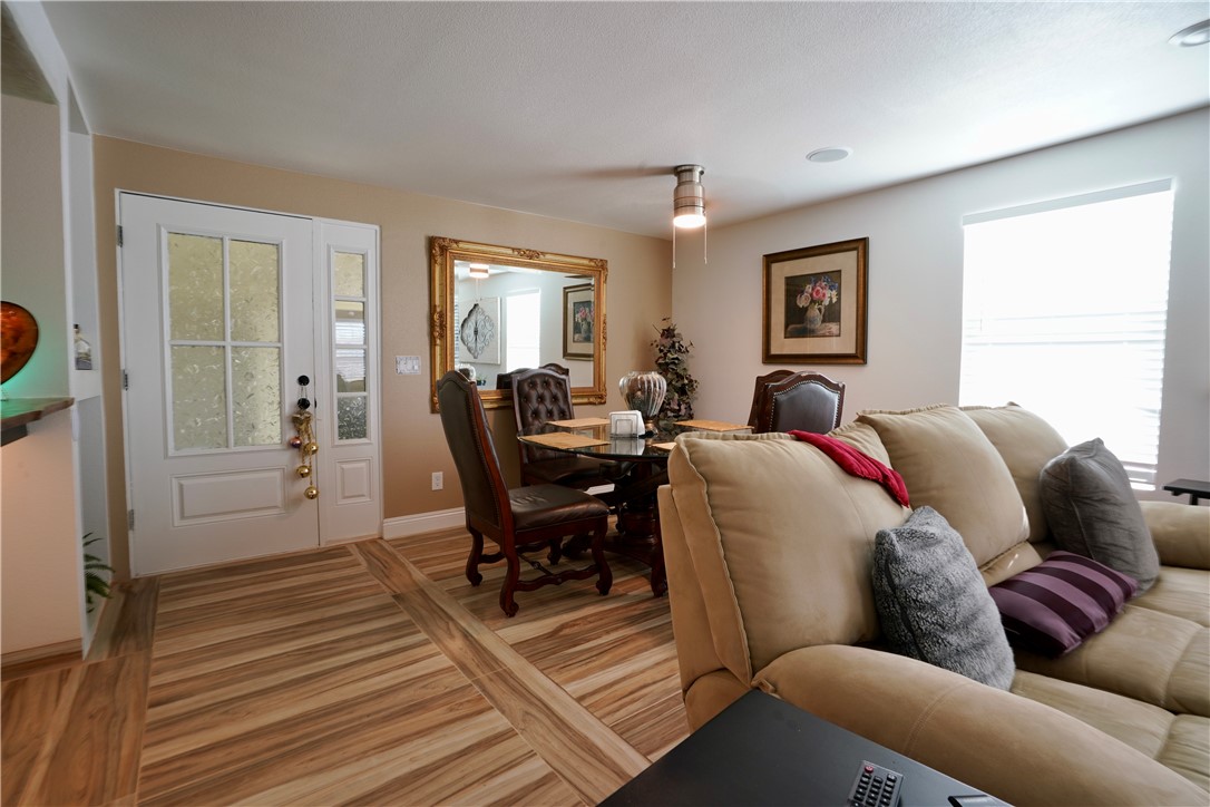 7296 Ligurta Road Golden Valley, AZ 86413 - Photo 11 of 49 a living room with a couch and a table