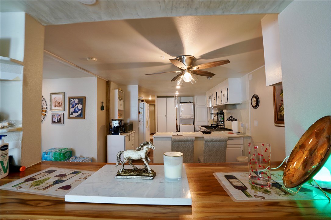 7296 Ligurta Road Golden Valley, AZ 86413 - Photo 14 of 49 a living room with furniture and a view of kitchen