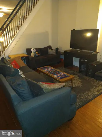 a view of kitchen with furniture and screen