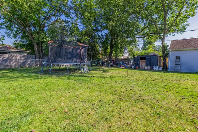 a house view with a sitting space and garden