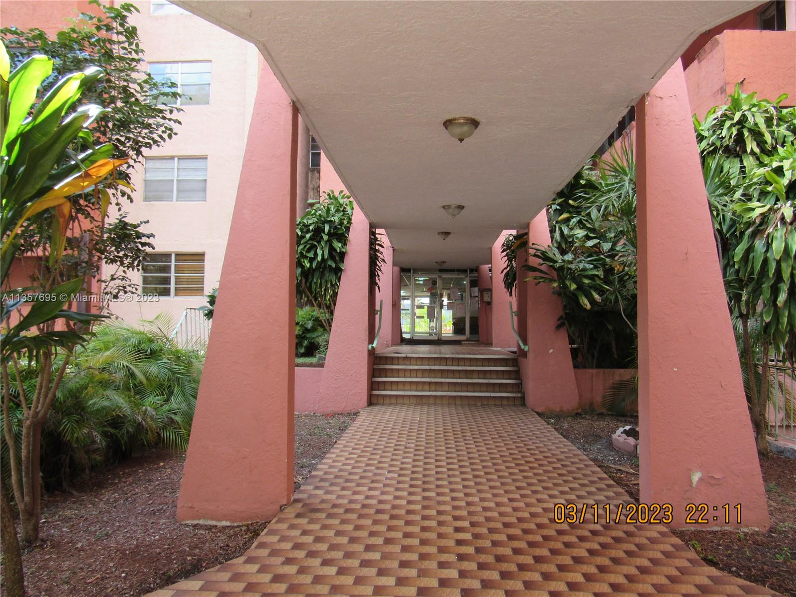 Flagami Miami, FL 33126 - Photo 2 of 12 a view of a pathway both side of house