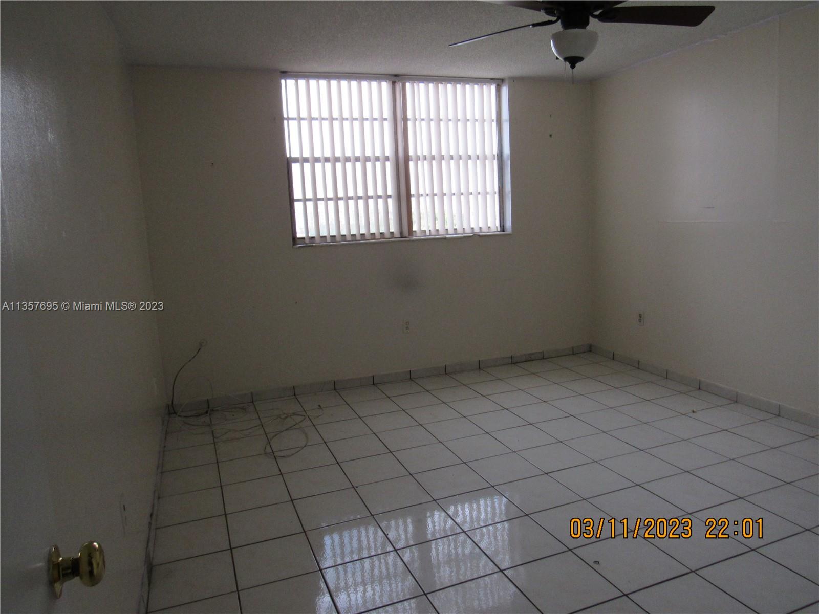 Flagami Miami, FL 33126 - Photo 7 of 12 an empty room with windows