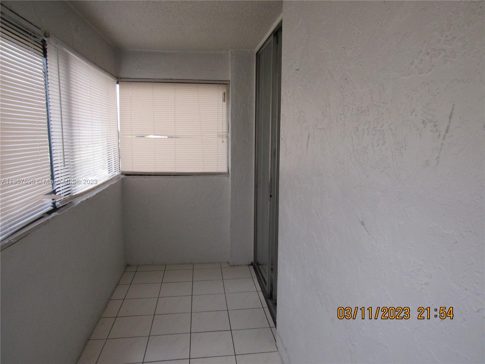 Flagami Miami, FL 33126 - Photo 9 of 12 a view of an empty room with a window