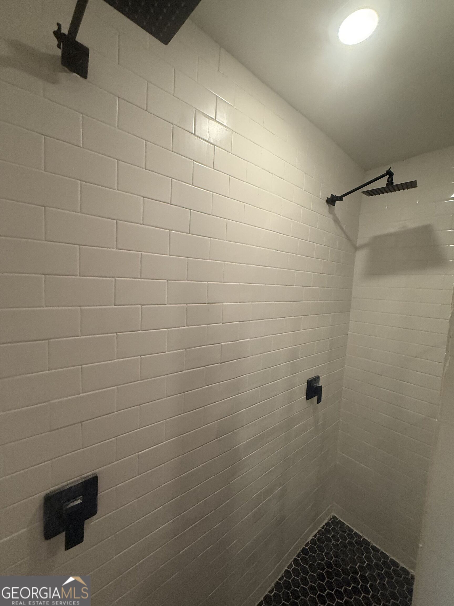 3861 Newnan Road Griffin, GA 30223 - Photo 76 of 89 a bathroom with a shower