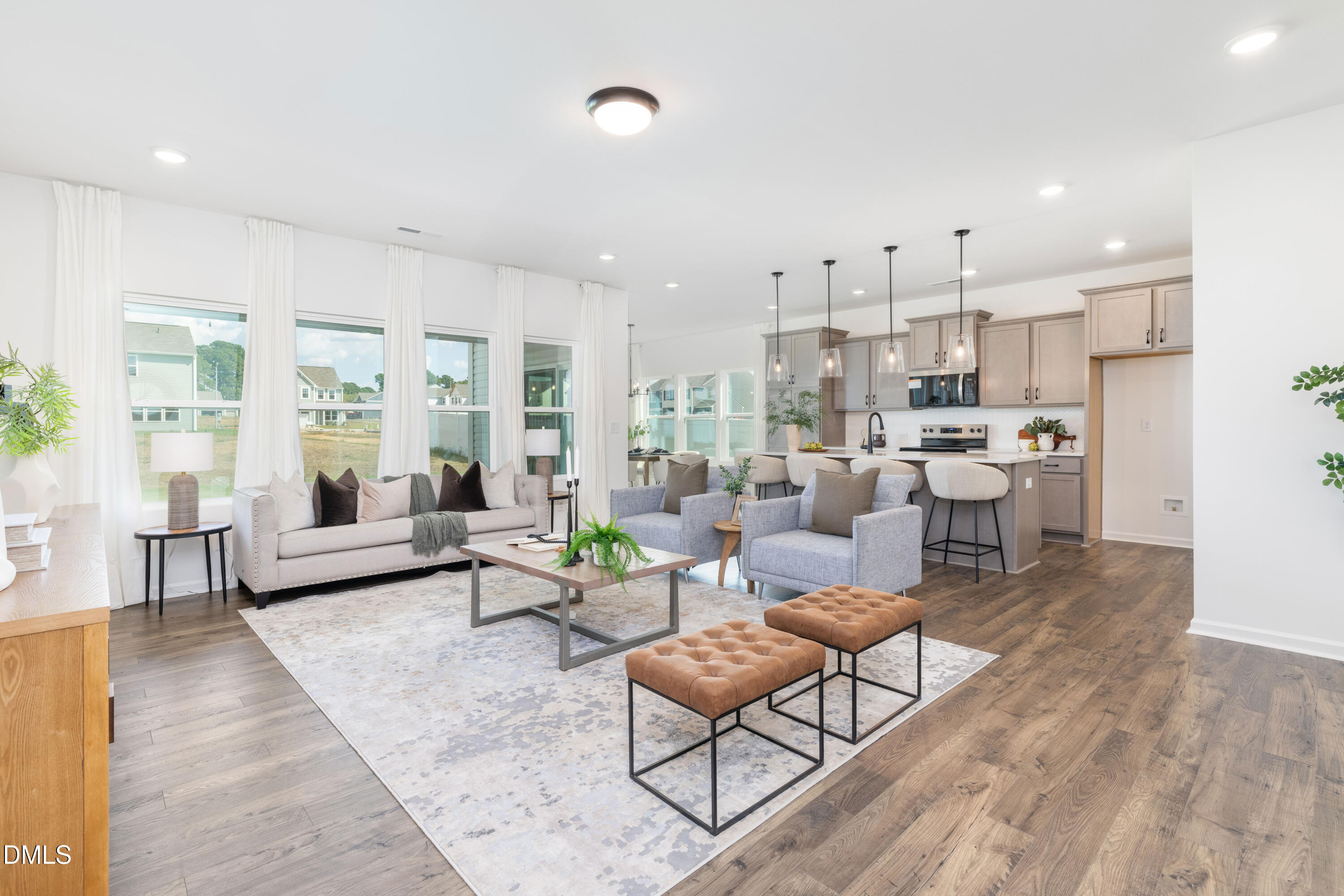 107 South Mule Way, Unit 90 Benson, NC 27504 - Photo 12 of 28 a living room with furniture and a large window
