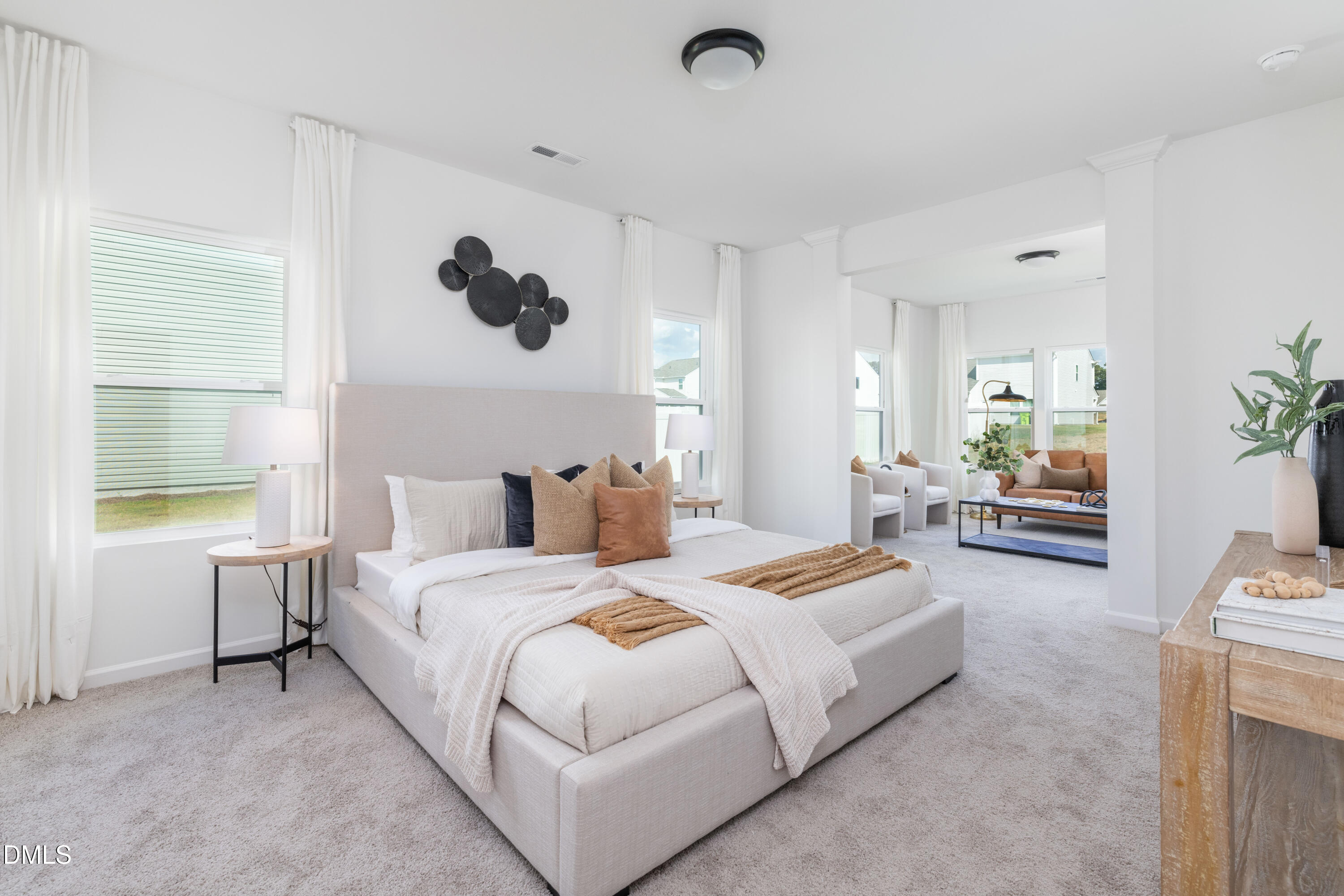 107 South Mule Way, Unit 90 Benson, NC 27504 - Photo 14 of 28 a bedroom with a bed and a couch