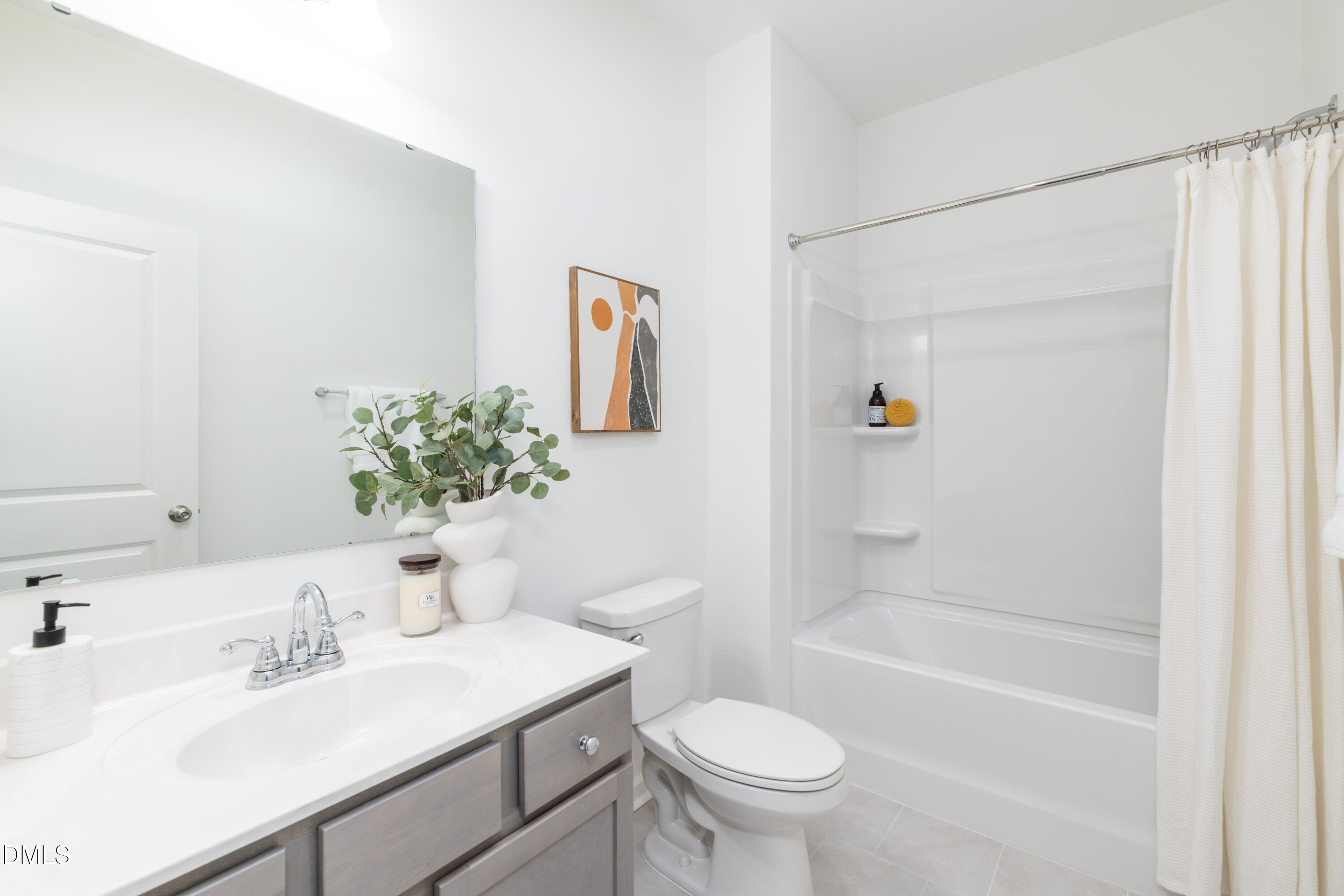 107 South Mule Way, Unit 90 Benson, NC 27504 - Photo 23 of 28 a bathroom with a sink toilet and shower