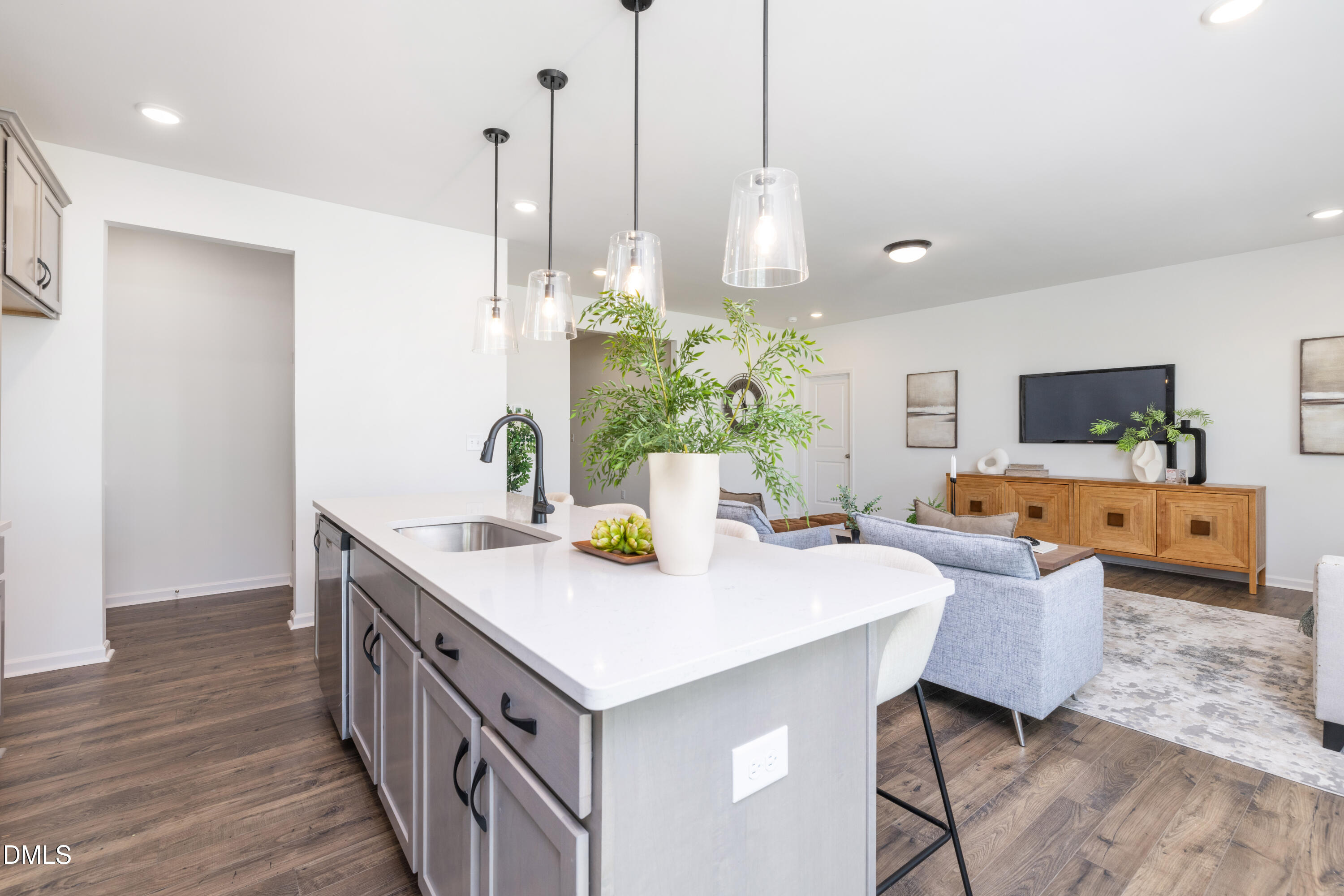 107 South Mule Way, Unit 90 Benson, NC 27504 - Photo 6 of 28 a view of kitchen island with stainless steel appliances