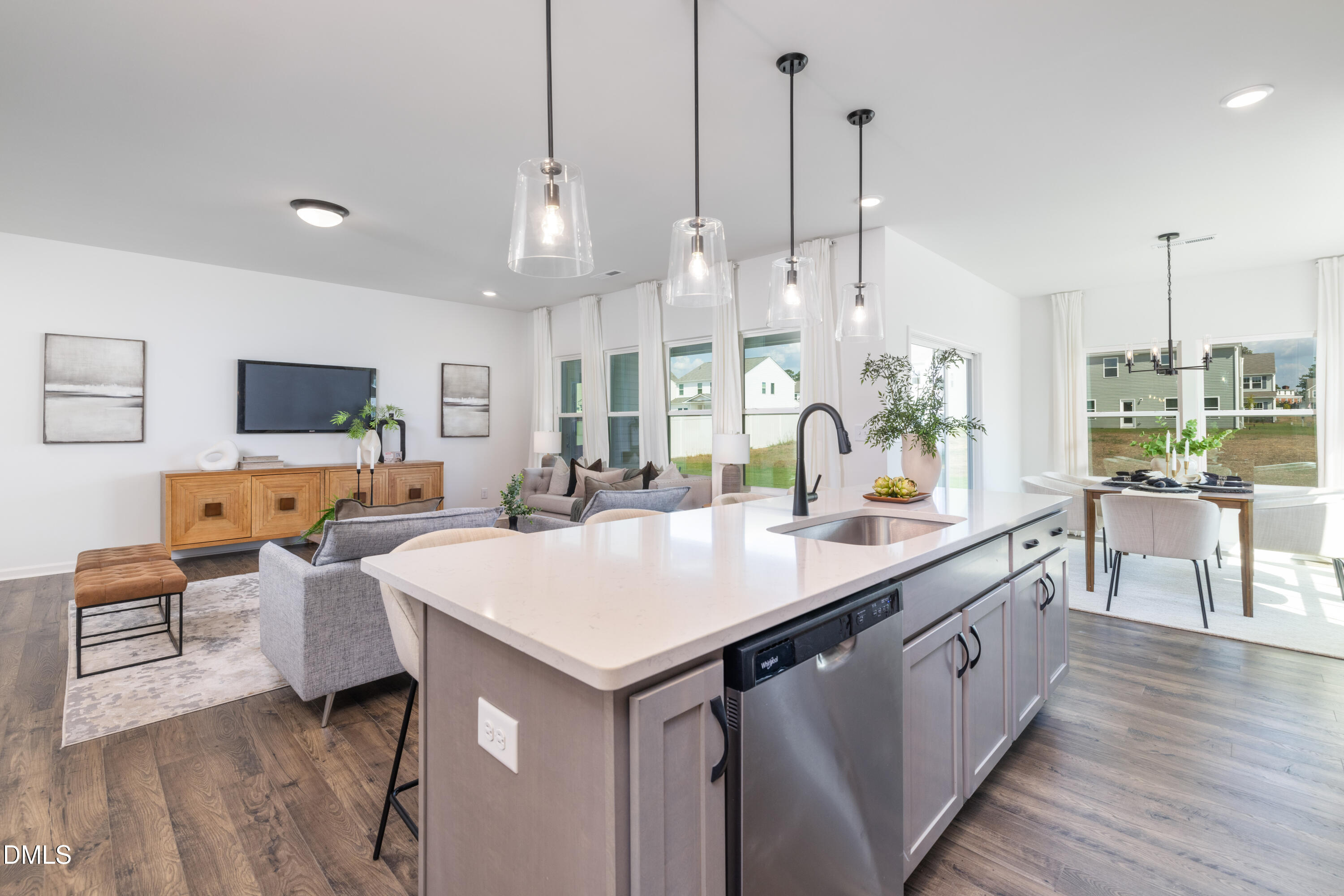 107 South Mule Way, Unit 90 Benson, NC 27504 - Photo 7 of 28 a large kitchen with kitchen island a large island in it