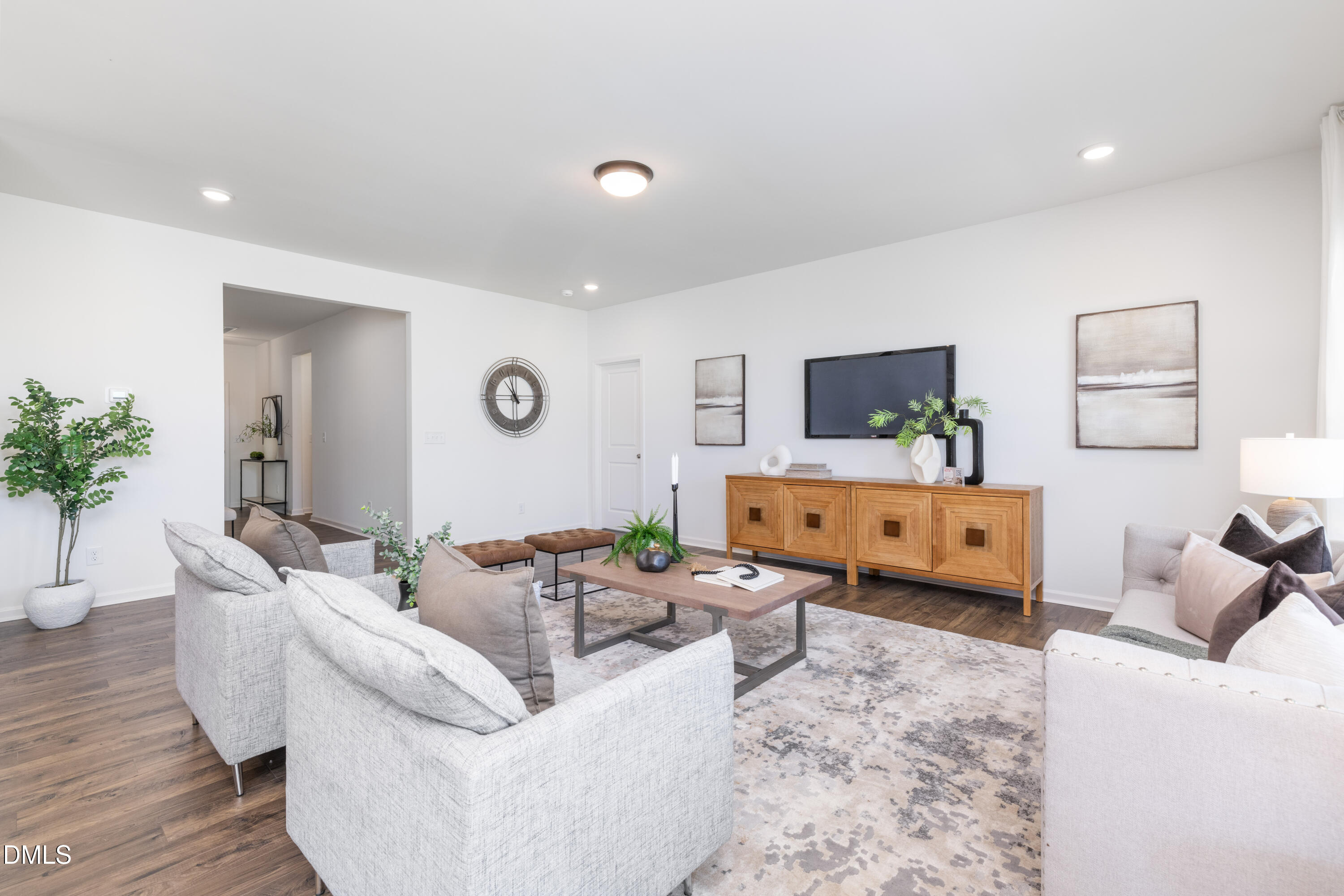 107 South Mule Way, Unit 90 Benson, NC 27504 - Photo 10 of 28 a living room with furniture and wooden floor