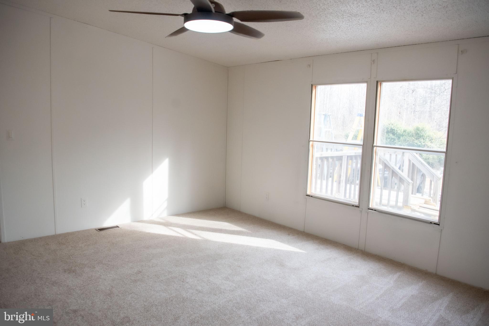 8705 Alsop Town Road Spotsylvania, VA 22551 - Photo 13 of 15 an empty room with a window