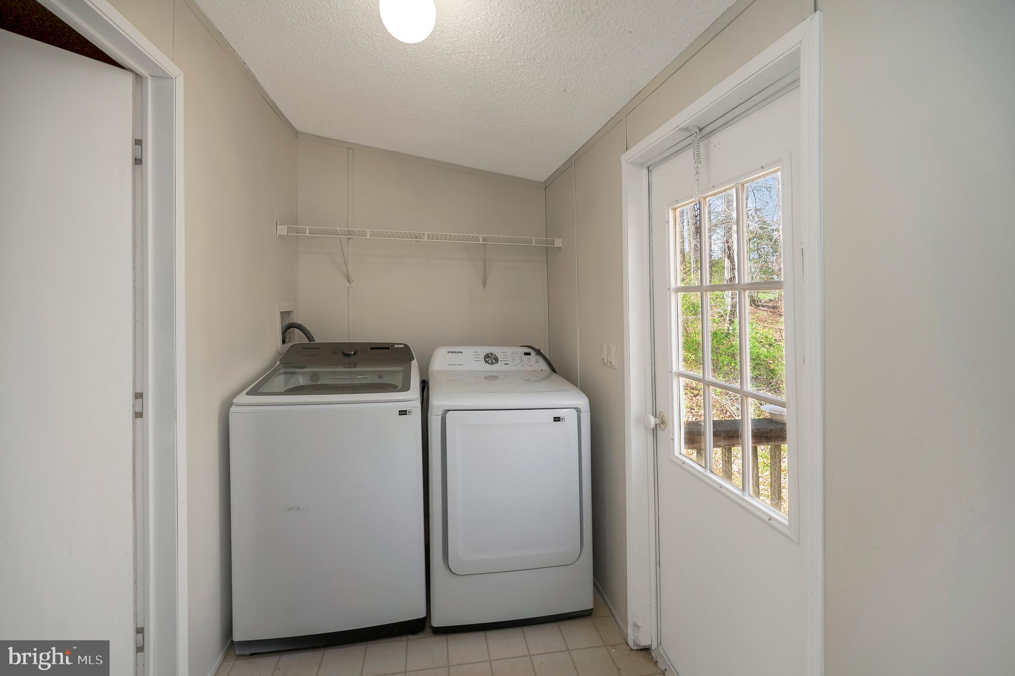 8705 Alsop Town Road Spotsylvania, VA 22551 - Photo 22 of 33 a utility room with dryer and washer