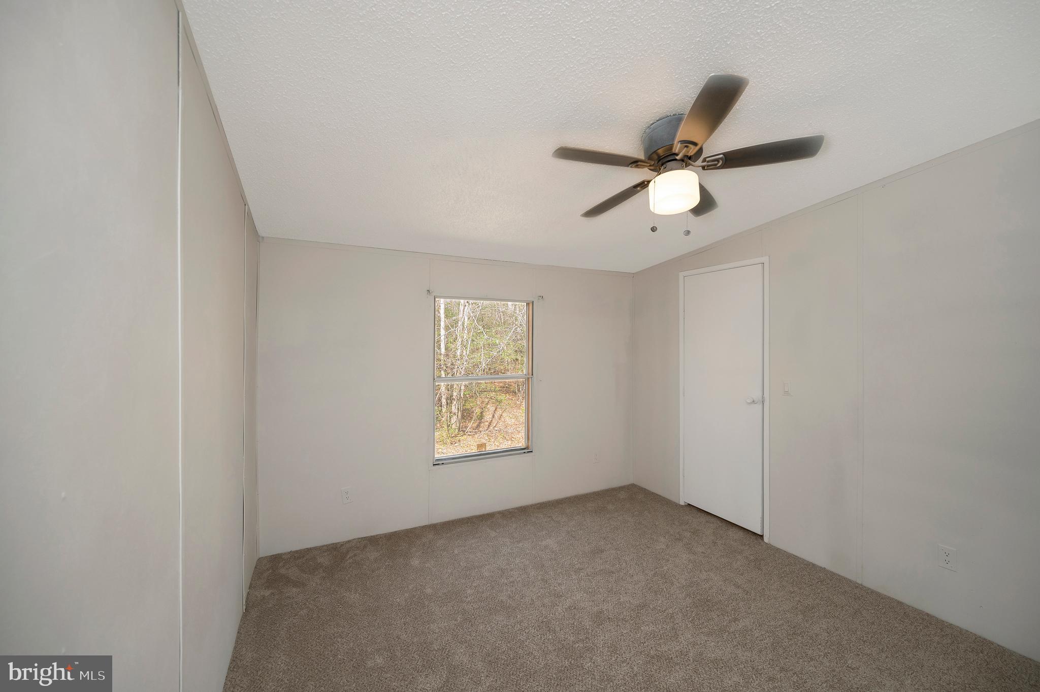 8705 Alsop Town Road Spotsylvania, VA 22551 - Photo 28 of 33 a view of an empty room with a window
