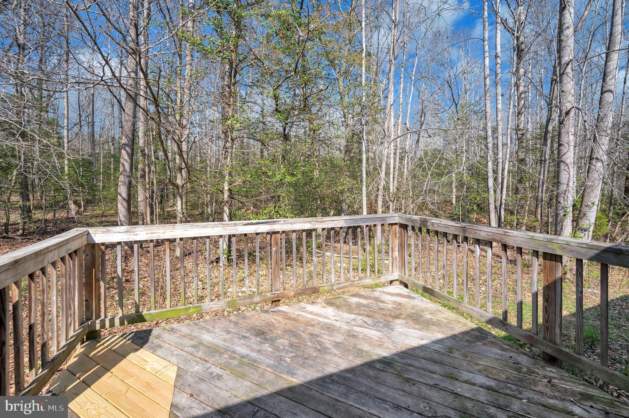 8705 Alsop Town Road Spotsylvania, VA 22551 - Photo 33 of 33 a balcony with wooden floor and fence