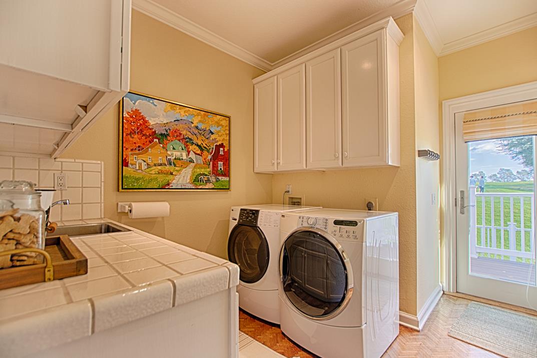 2140 Winged Foot Road Half Moon Bay, CA 94019 - Photo 15 of 52 a utility room with dryer and washer