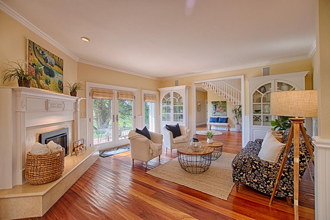 2140 Winged Foot Road Half Moon Bay, CA 94019 - Photo 17 of 52 a living room with furniture fireplace and a window