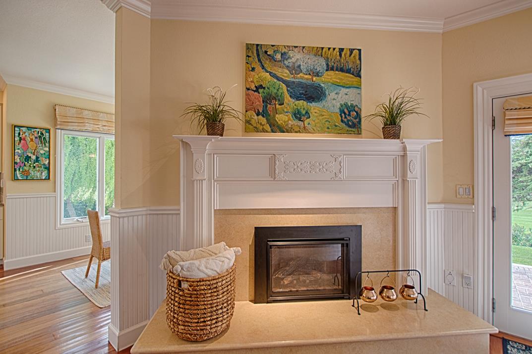 2140 Winged Foot Road Half Moon Bay, CA 94019 - Photo 19 of 52 a living room with furniture and a fireplace