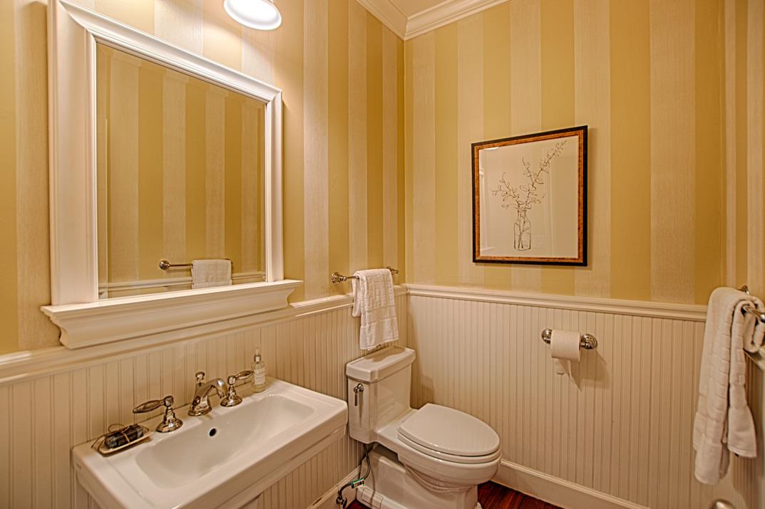 2140 Winged Foot Road Half Moon Bay, CA 94019 - Photo 21 of 52 a bathroom with a sink a toilet and mirror