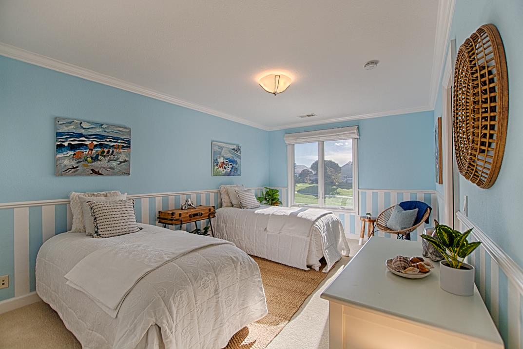 2140 Winged Foot Road Half Moon Bay, CA 94019 - Photo 28 of 52 a bedroom with two beds and a large window