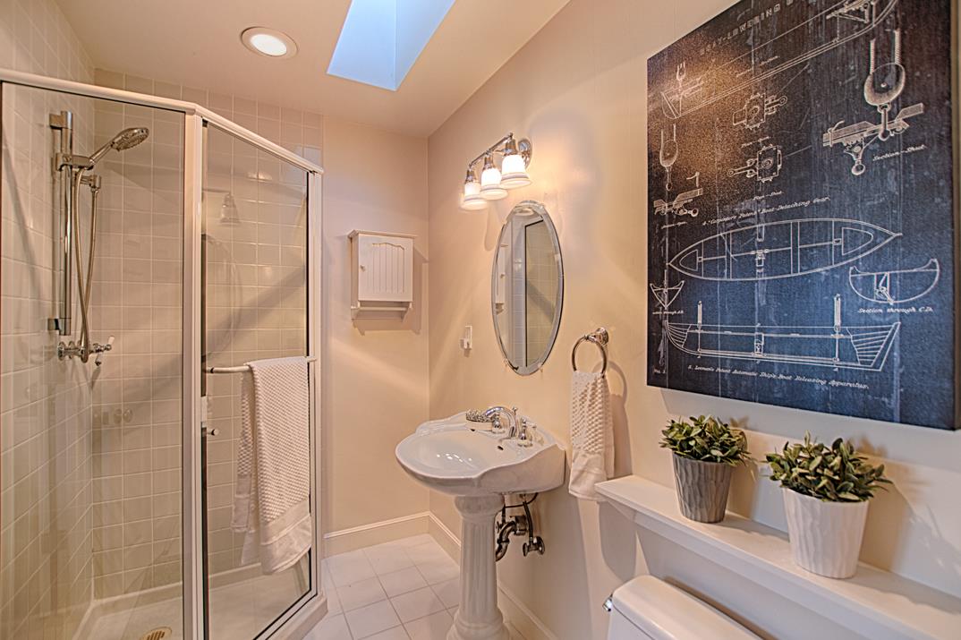 2140 Winged Foot Road Half Moon Bay, CA 94019 - Photo 30 of 52 a bathroom with a sink and a mirror