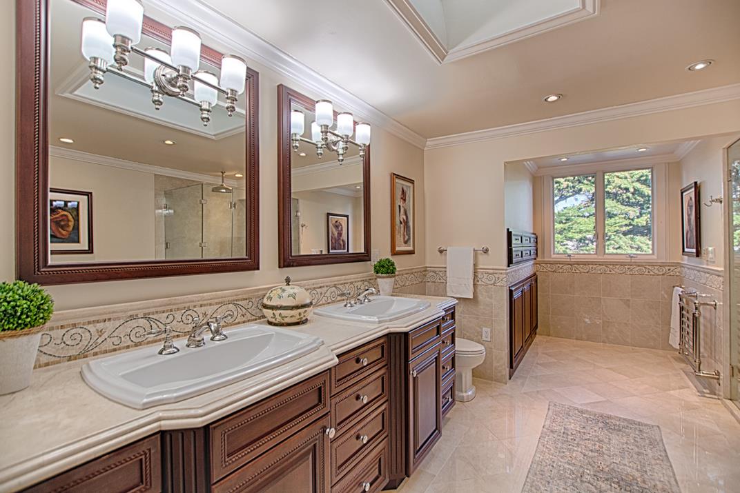 2140 Winged Foot Road Half Moon Bay, CA 94019 - Photo 36 of 52 a en suite bathroom with double vanity and a mirror
