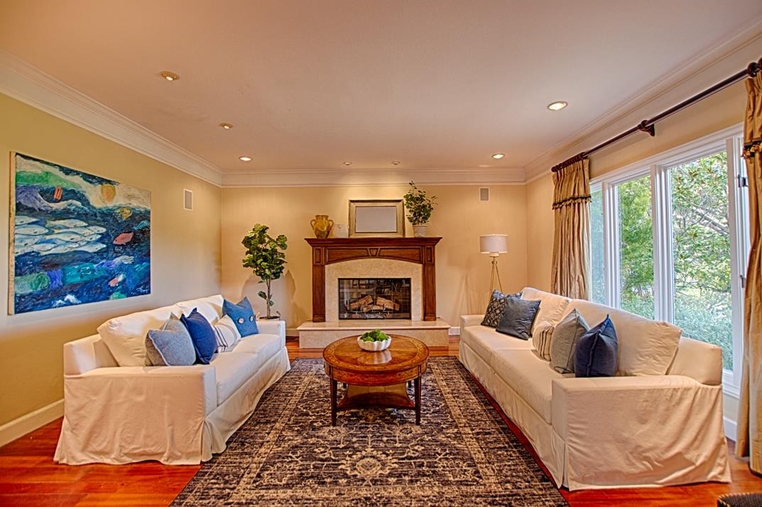 2140 Winged Foot Road Half Moon Bay, CA 94019 - Photo 7 of 52 a living room with furniture and a fireplace