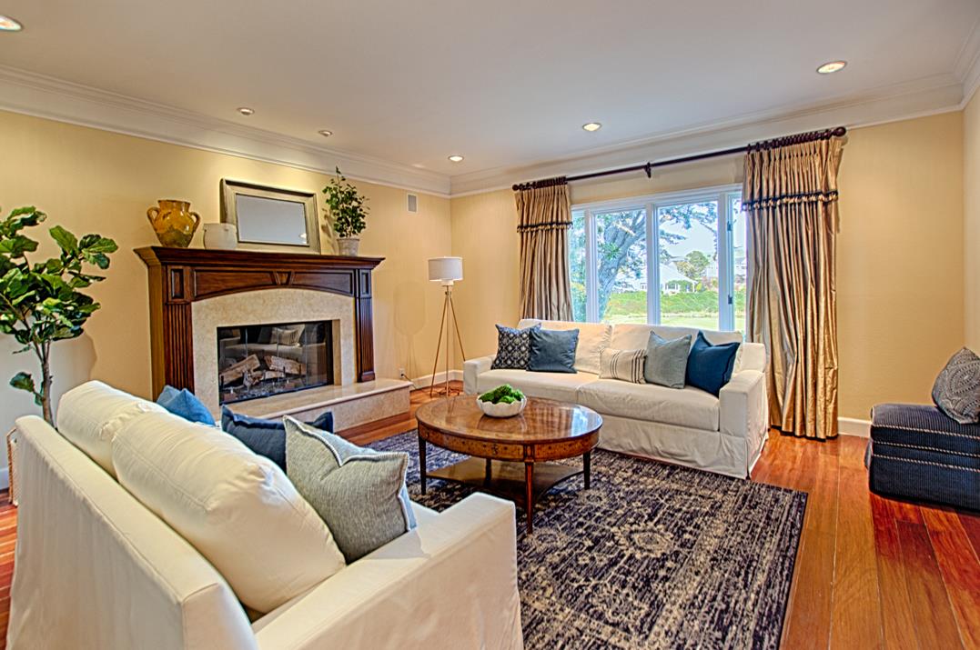 2140 Winged Foot Road Half Moon Bay, CA 94019 - Photo 8 of 52 a living room with furniture and a fireplace