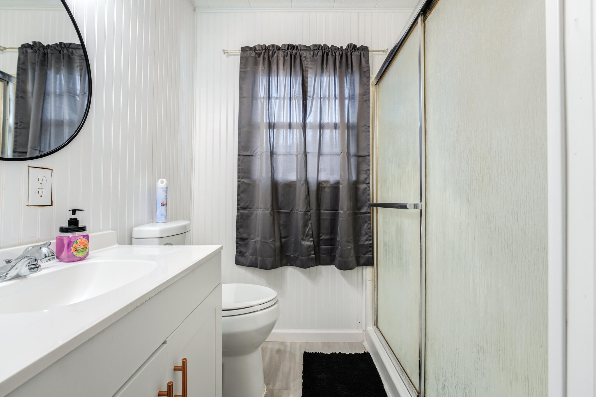 4612 Canton Avenue Lubbock, TX 79413 - Photo 15 of 15 a bathroom with a sink toilet and shower