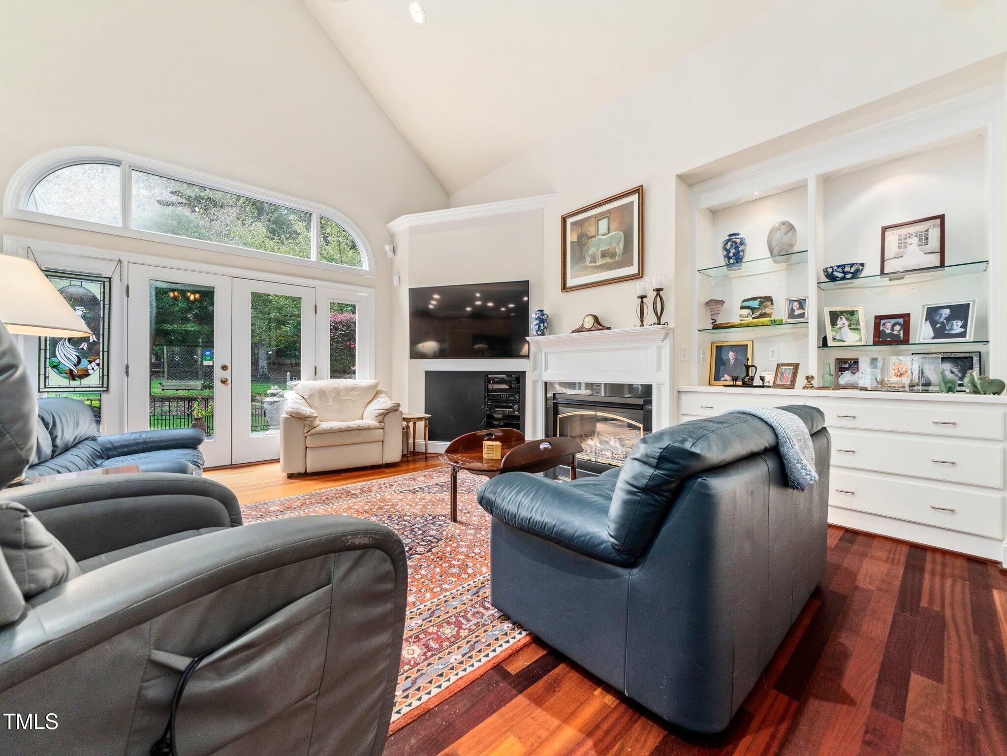 10937 Cahill Road Raleigh, NC 27614 - Photo 10 of 53 Great Rm has Bank of Windows to let Sunshine in + Vaulted Ceiling to Accent Spaciousness!