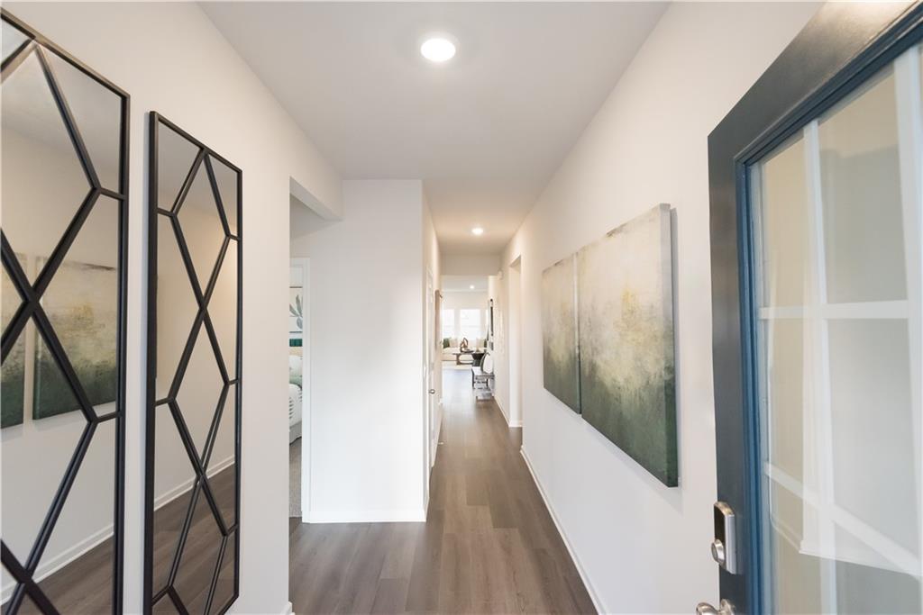 3940 Ladiga Street Powder Springs, GA 30127 - Photo 16 of 31 a view of hallway with wooden floor