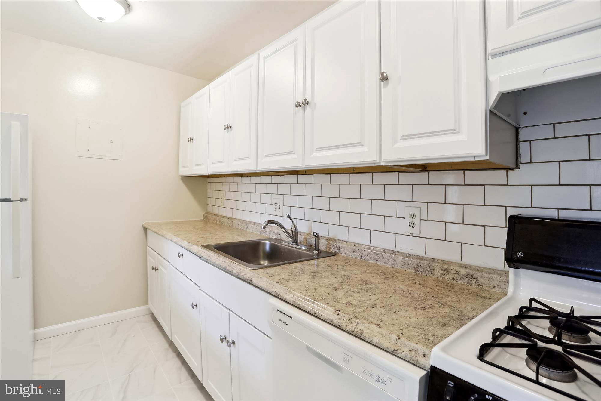 3732 Bel Pre Road, Unit 37325 Silver Spring, MD 20906 - Photo 12 of 30 Bright Kitchen with Subway Tile Backsplash