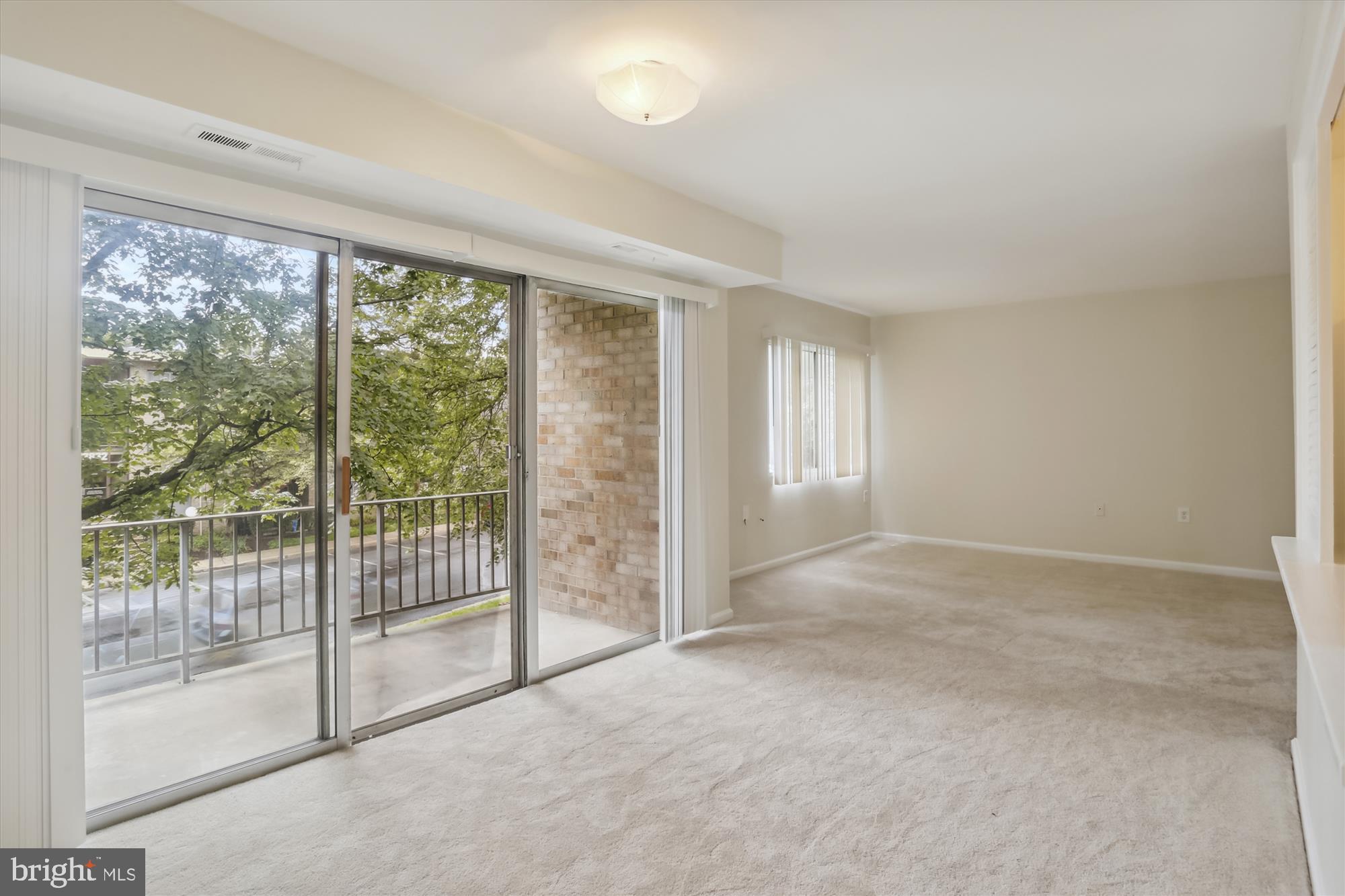 3732 Bel Pre Road, Unit 37325 Silver Spring, MD 20906 - Photo 8 of 30 Dining / Living Room with Access to the Balcony