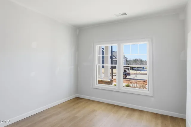 an empty room with windows