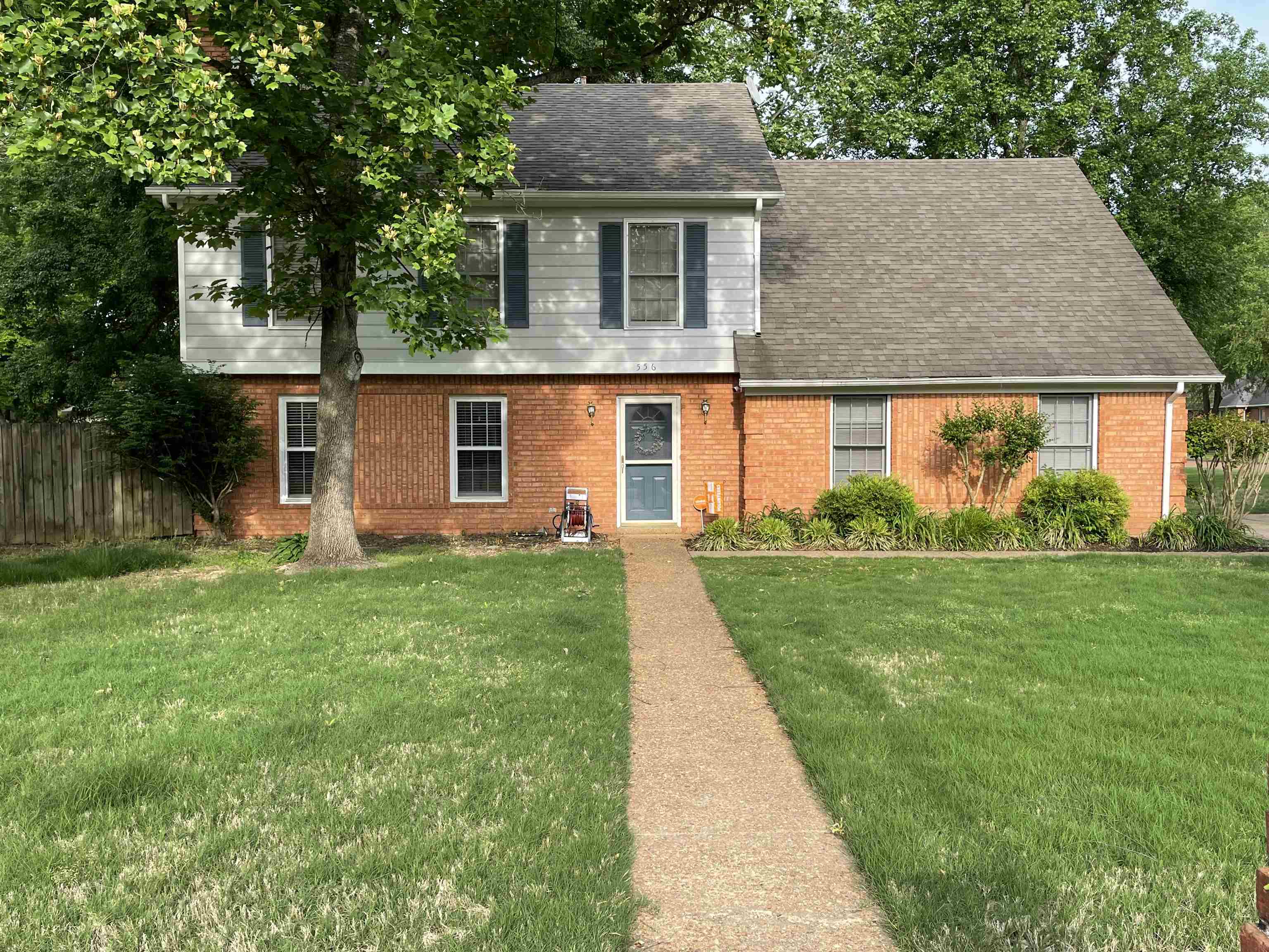 556 Rillbrook Drive Collierville, TN 38017 - Photo 1 of 22 a aerial view of a house with a yard