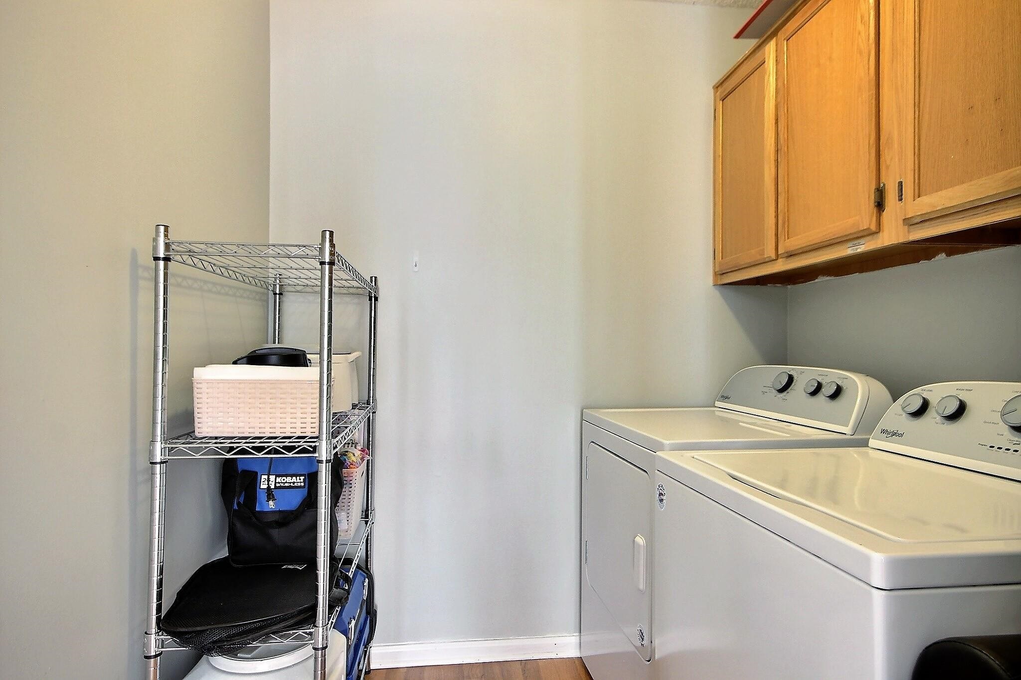556 Rillbrook Drive Collierville, TN 38017 - Photo 10 of 22 a utility room with dryer and washer