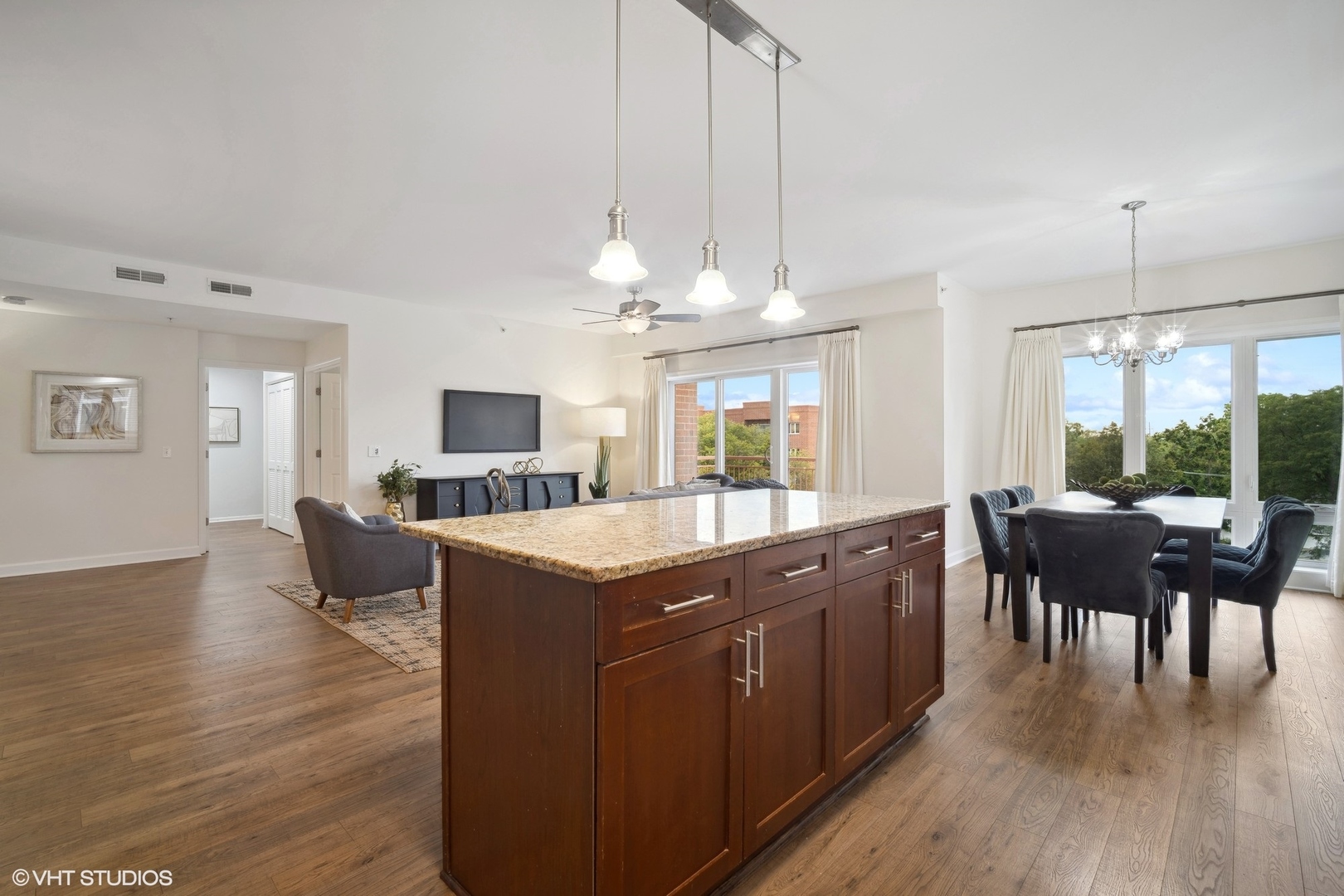 799 Graceland Avenue, Unit 502A Des Plaines, IL 60016 - Photo 15 of 31 a kitchen with stainless steel appliances granite countertop a stove and cabinets
