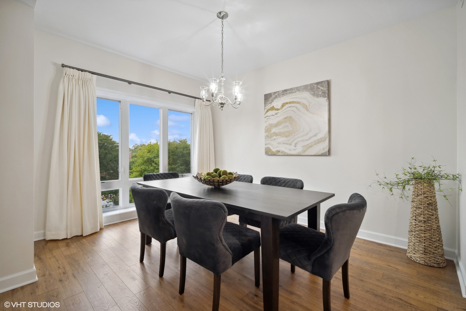 799 Graceland Avenue, Unit 502A Des Plaines, IL 60016 - Photo 17 of 31 a view of a dining room with furniture window and wooden floor